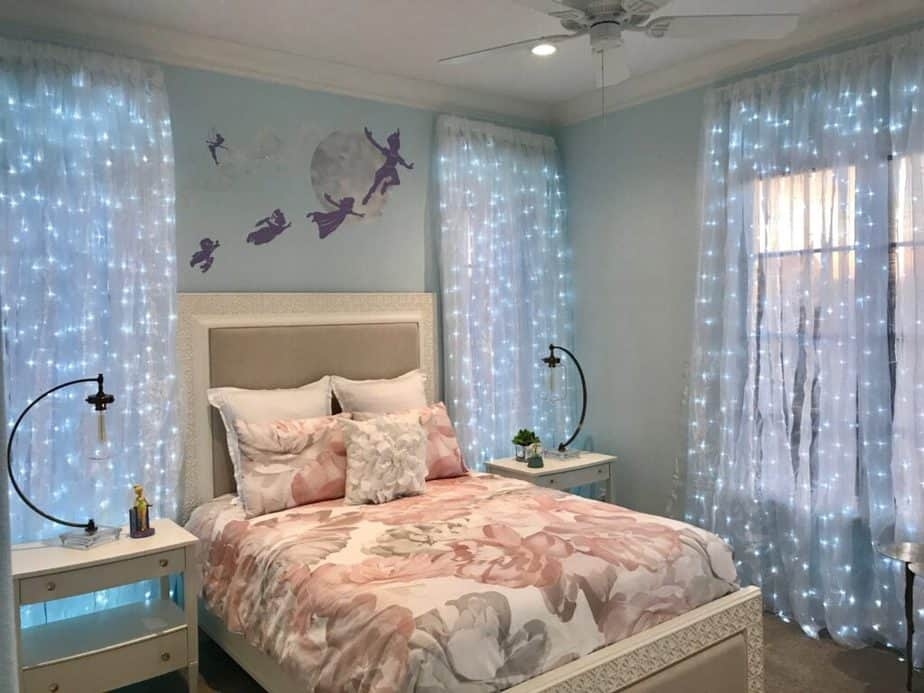 Platform Bed with Arched Lamps and Whimsical Fairy Bedroom Decor