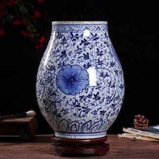 Porcelain Vase with Crackle Glaze and Ornate Wood Stand