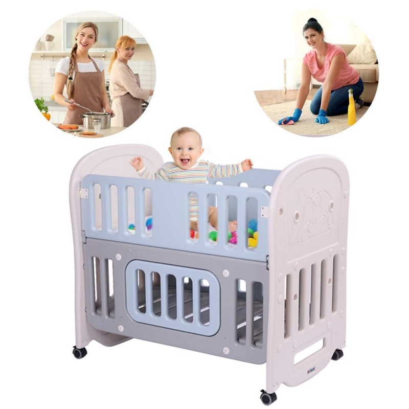 Portable Mini Crib with Dual Tier Storage and Locking Wheels