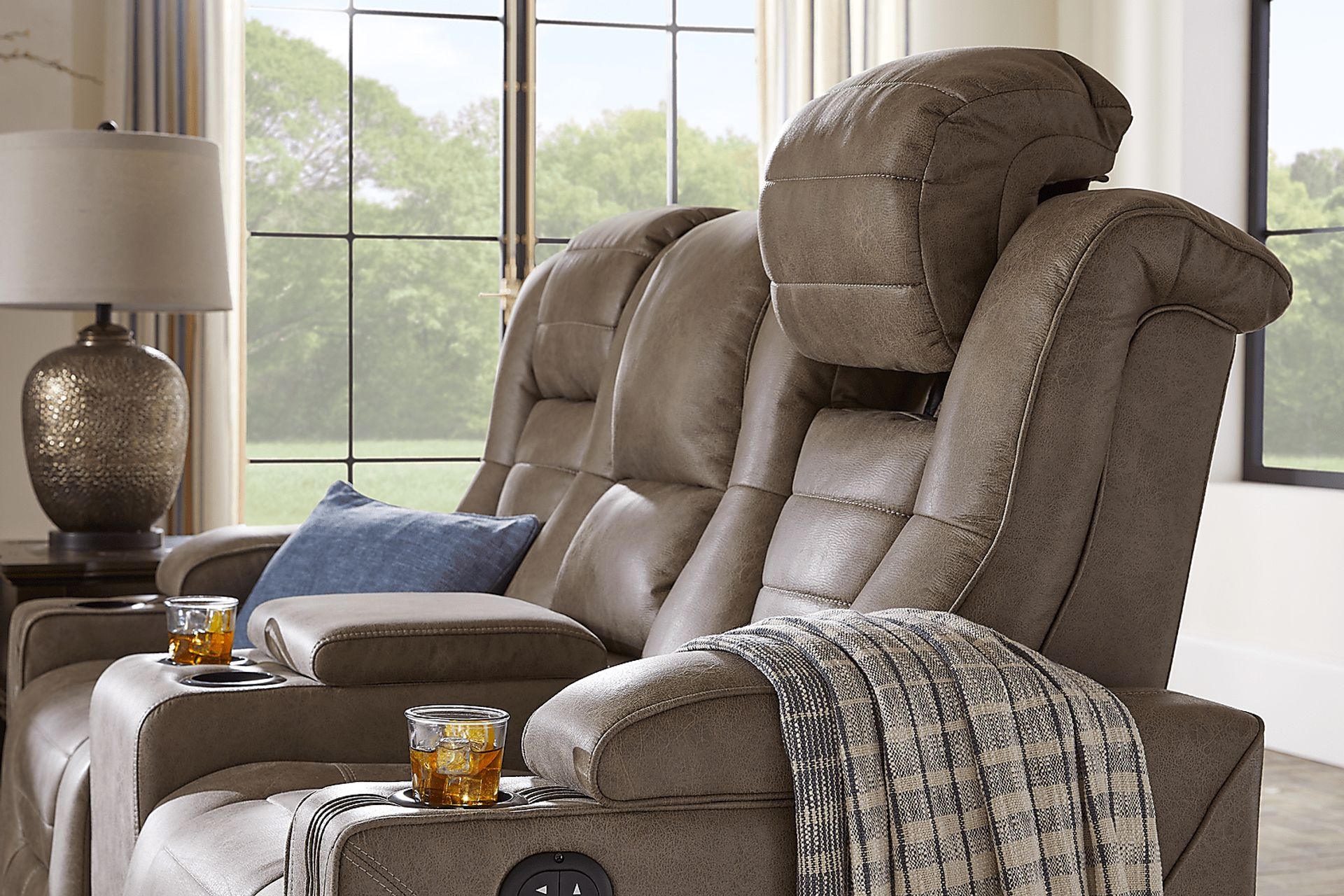 Reclining Loveseat with Adjustable Headrests and Taupe Seating