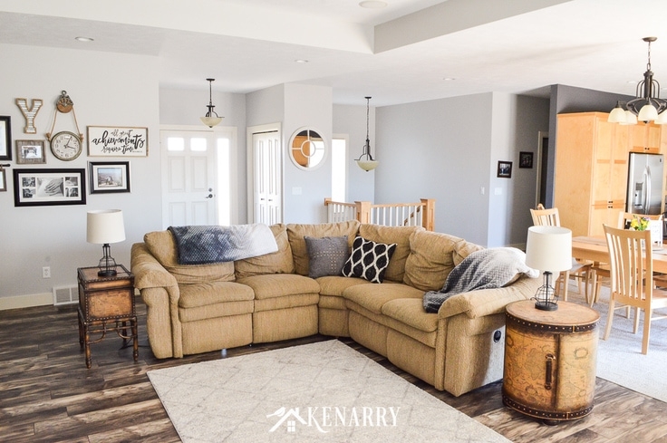 Sectional Sofa with Barrel Accent Table and Mixed Gallery Wall
