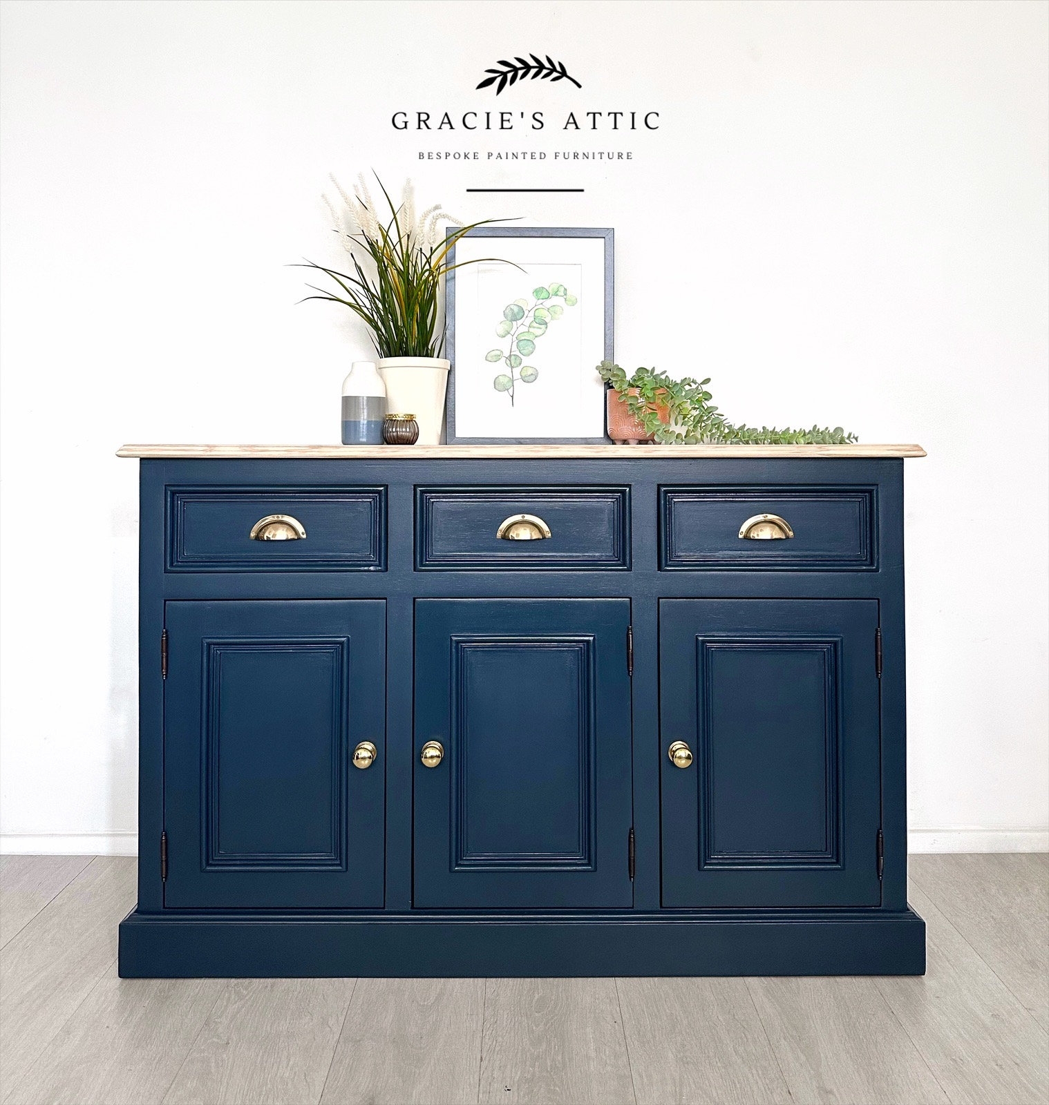 Sideboard with Brass Cup Pulls and Wood Countertop