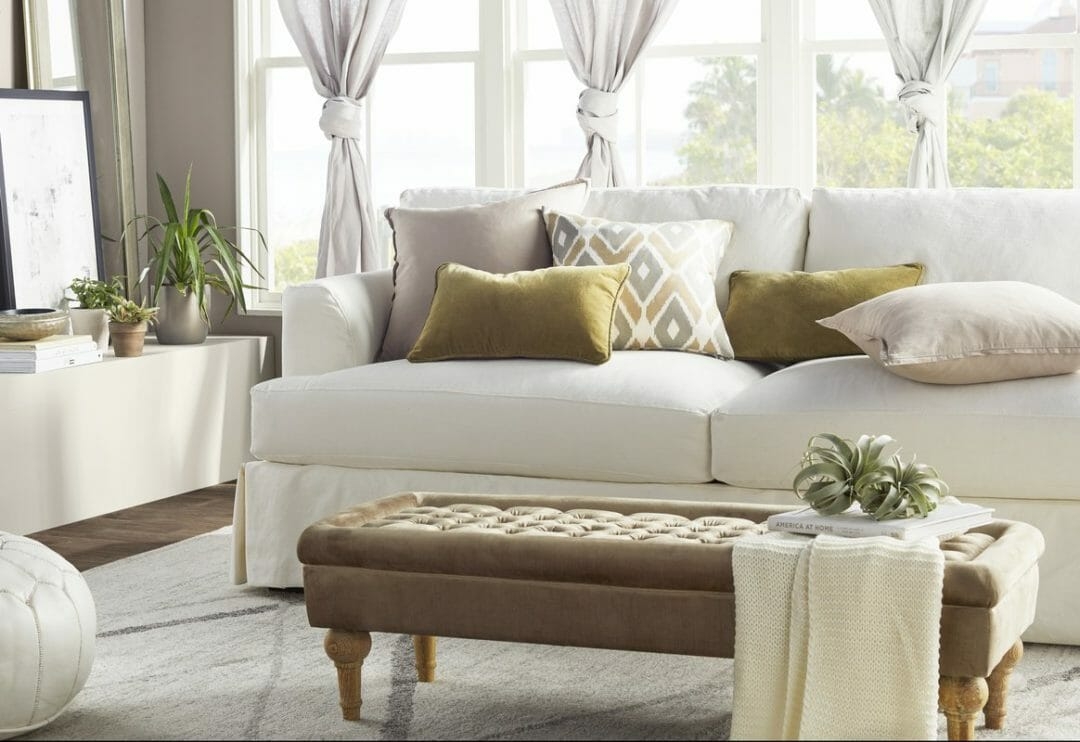 Slipcovered Sofa with Olive Accents and Olive Green Lumbar Pillows