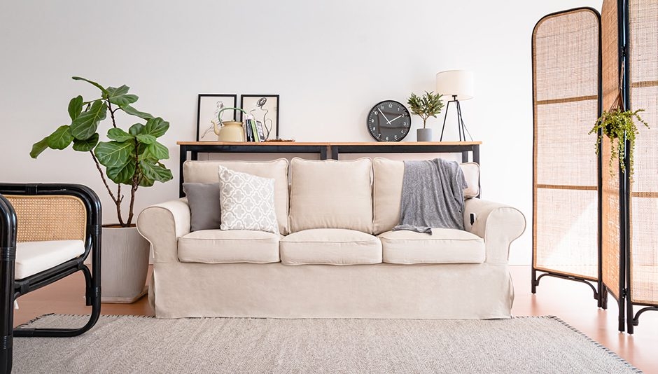 Slipcovered Sofa with Rattan Cane Panels and Rolled Arm Design