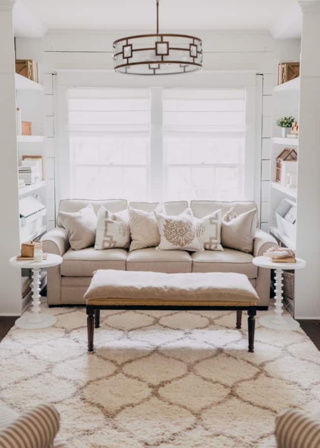 Sofa with Geometric Pendant and Beaded Leg Side Table Ideas