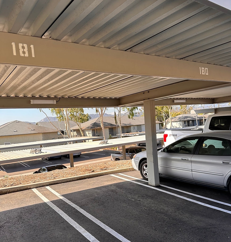 Solar Carport with Numbered Stalls and Metal Corrugated Roof