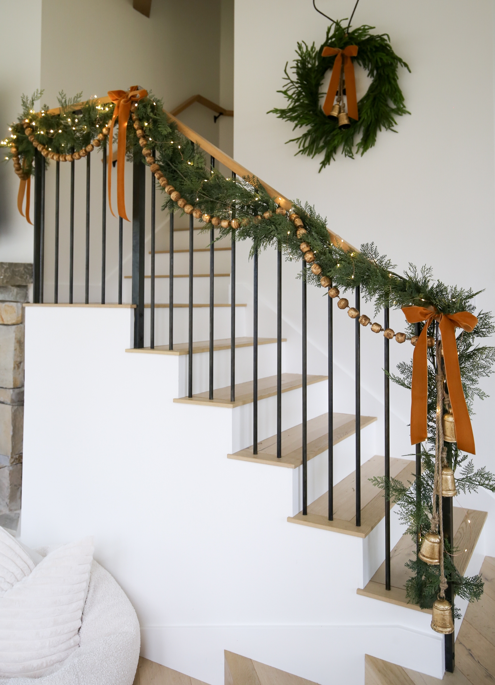 Staircase Decor with Burnt Orange Velvet and Wooden Bead Garland