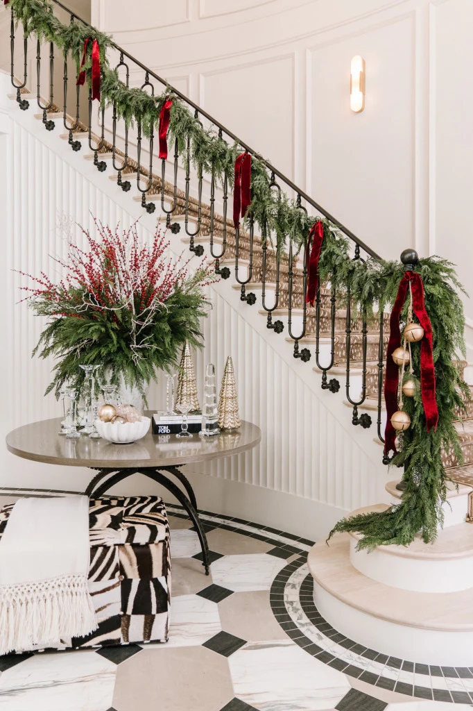 Staircase Decor with Zebra Print Ottoman and Grand Greenery