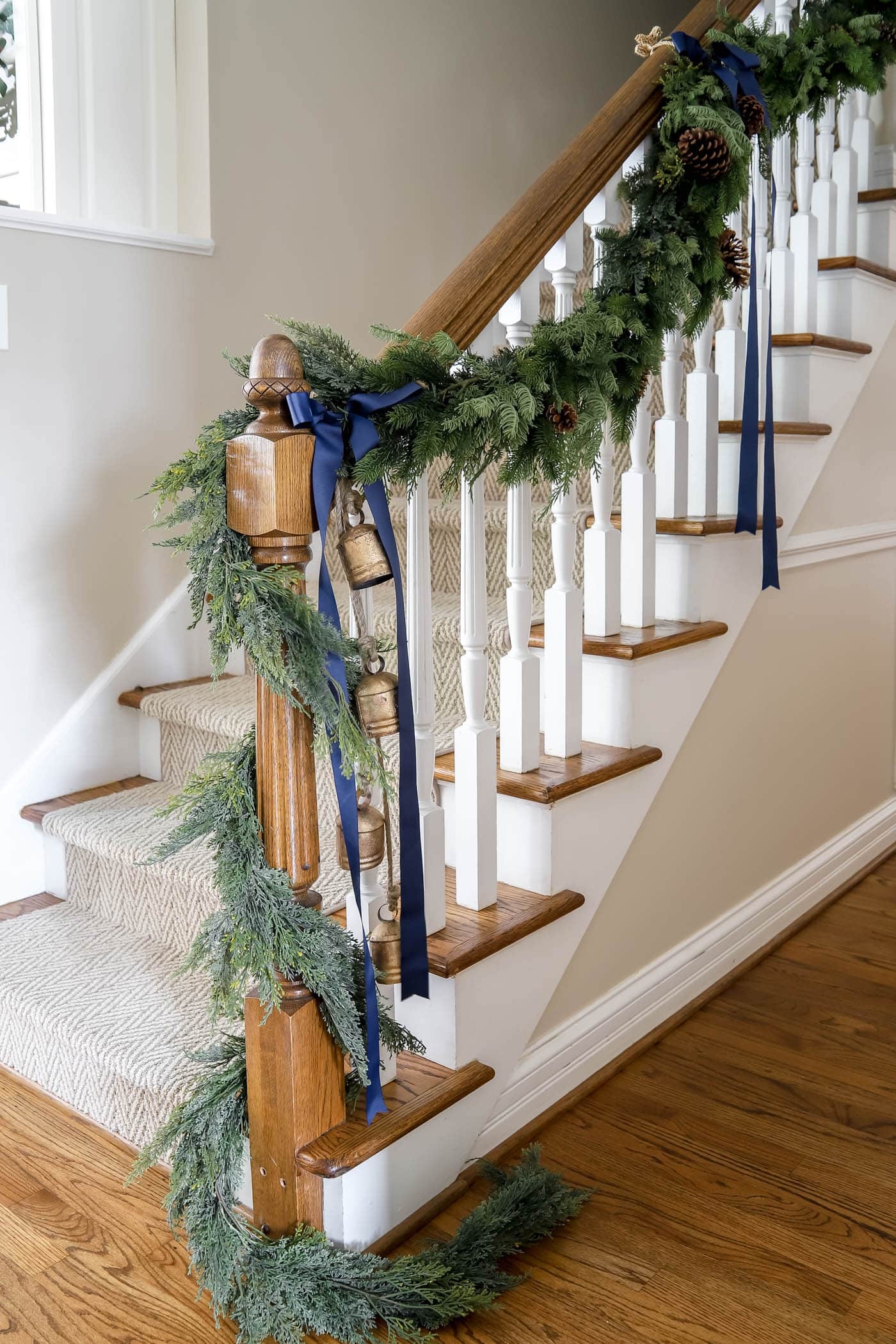Staircase Garland with Navy Blue Ribbons and Gold Cowbells