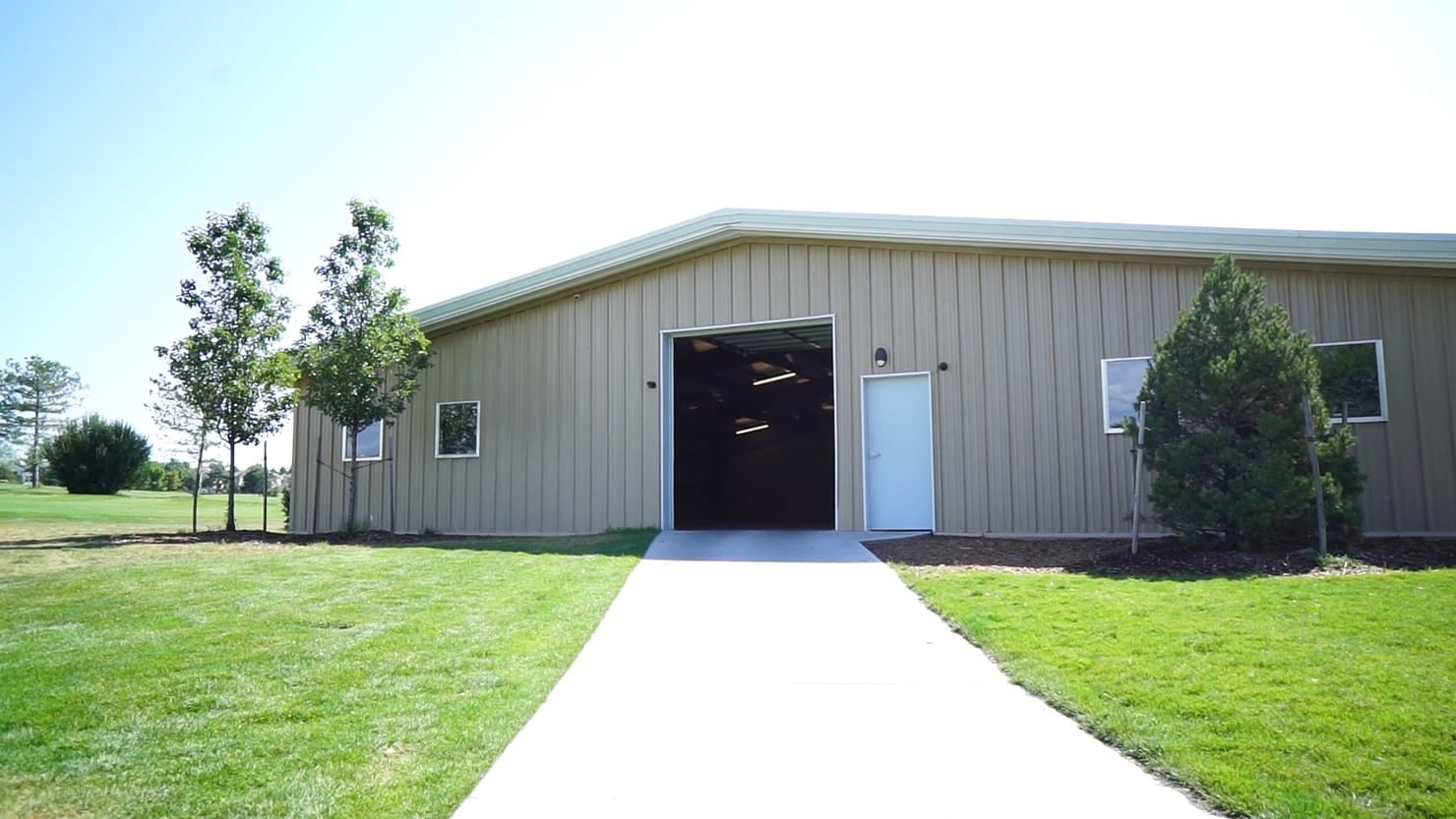 Storage Building: Pre-Engineered Steel Garage with Tan Siding
