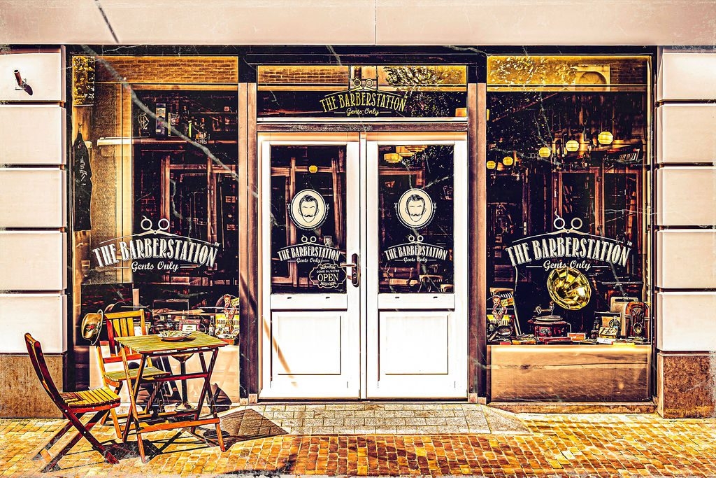 Storefront with Branded Decals and Sidewalk Cafe Seating