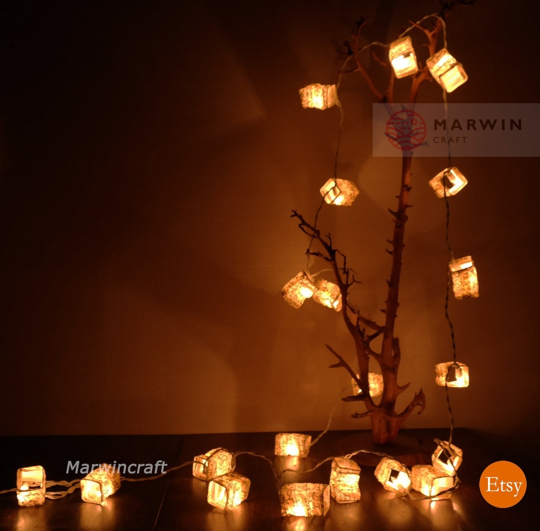 String Lights: Cubic Paper Shades with Organic Branch Decor Idea