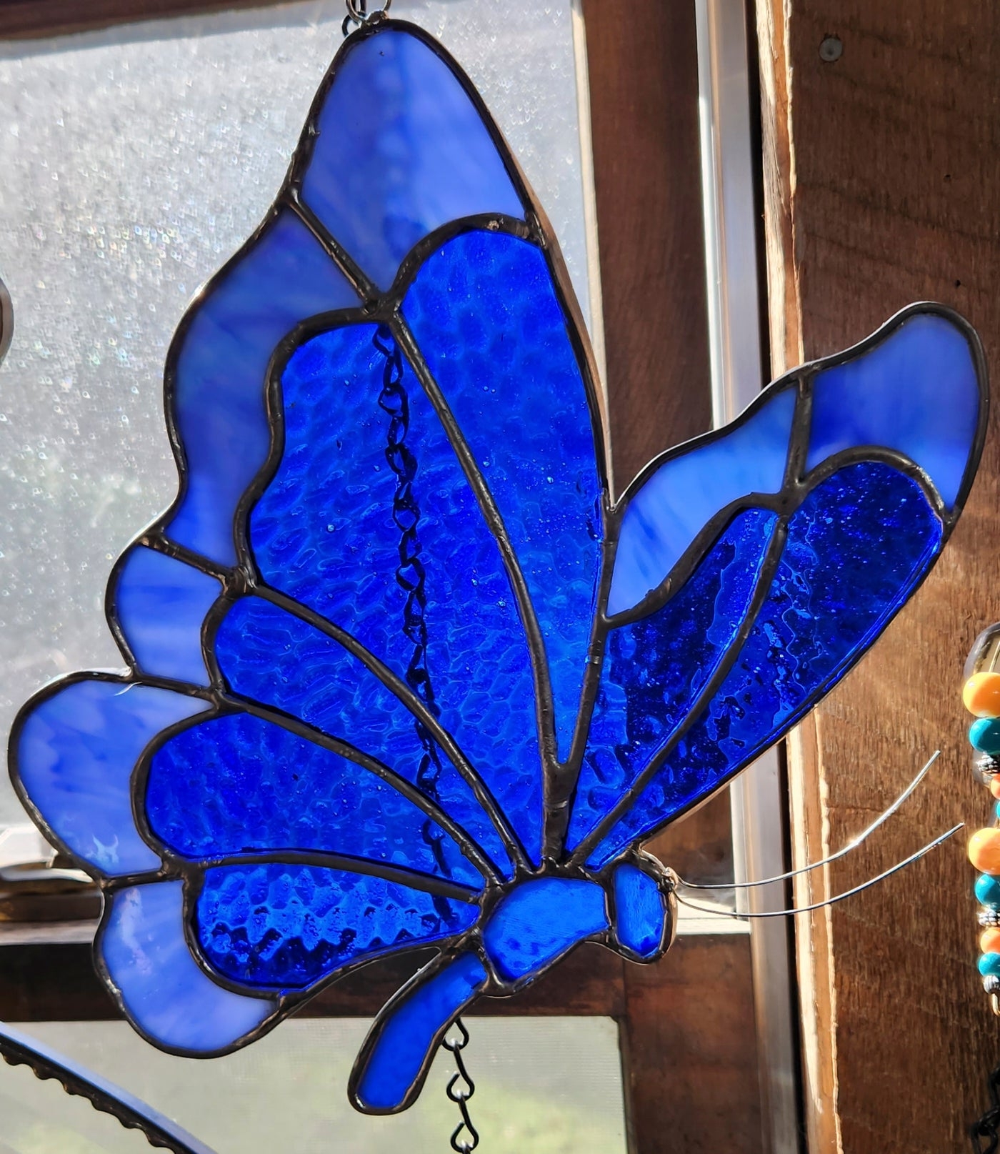 Suncatcher: Butterfly Shape Rippled Blue Glass Art