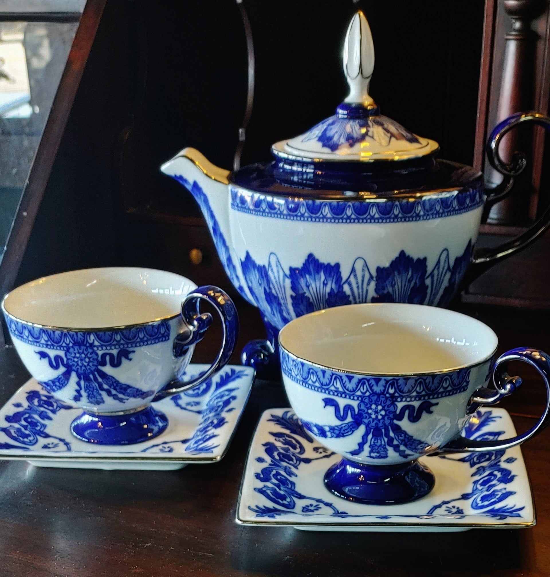 Tea Set with Square Saucers and Ornate Metallic Trim