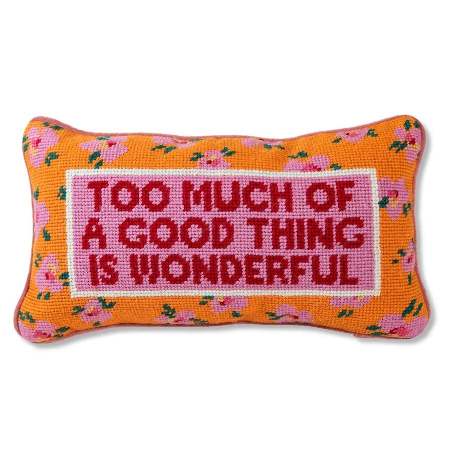Throw Pillow in Vibrant Orange with Cheeky Floral Design