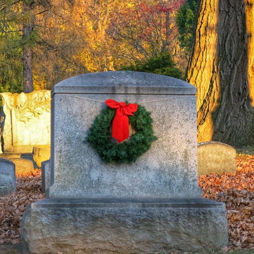 Tombstone Holiday Cemetery Wreath Ideas with Evergreen Wreath and Red Bow