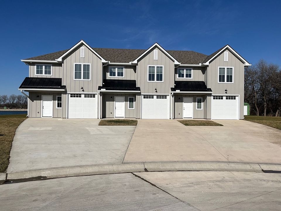 Townhouse Building with Board and Batten Siding and White Trim