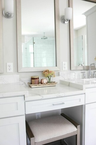 Vanity Set with White Shaker Cabinetry and Marble Top
