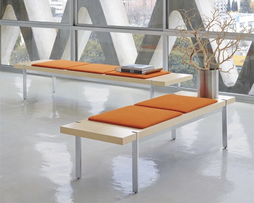 Waiting Bench with Orange Cushion Accents and Wood Base