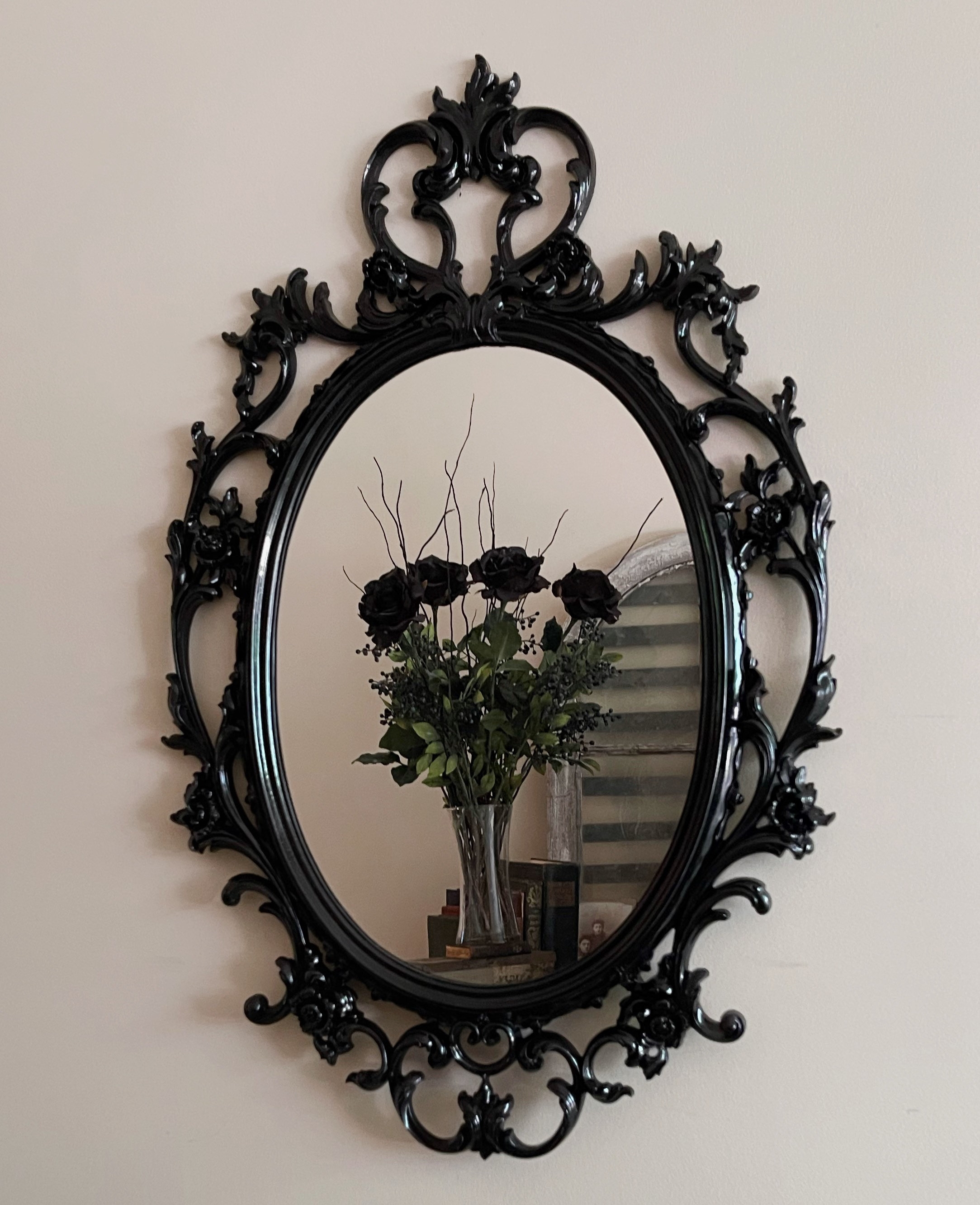 Wall Mirror in Gloss Black with Ornate Scrollwork Crest