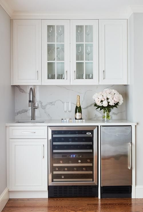 Wet Bar Design With Slab Backsplash And Dual Cooling