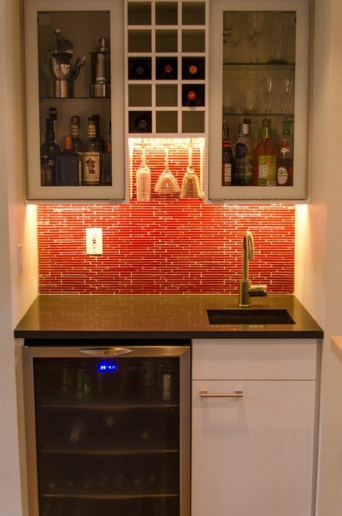 Wet Bar Setup Featuring Red Mosaic Backsplash And Storage