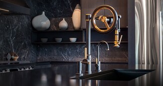 Wheel Pulldown Faucet: Pulley Design with Metallic Accents.