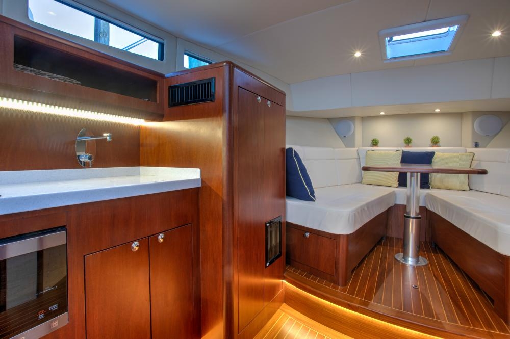 Yacht Cabin with Integrated Microwave and Polished Wood Boat Cabin