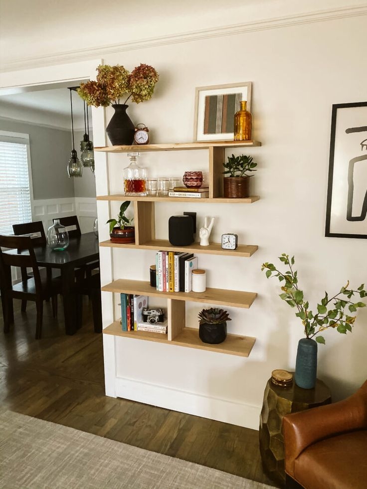Asymmetrical Wall Shelves with Staggered Wood Dividers