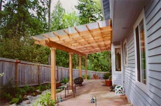 Attached Pergola With Corrugated Roof for Backyard Shade