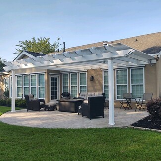 Attached Pergola With Ornamental Joist Ends in White