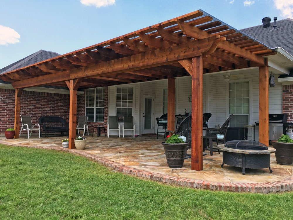 Attached Pergola With Translucent Roofing and End Cuts