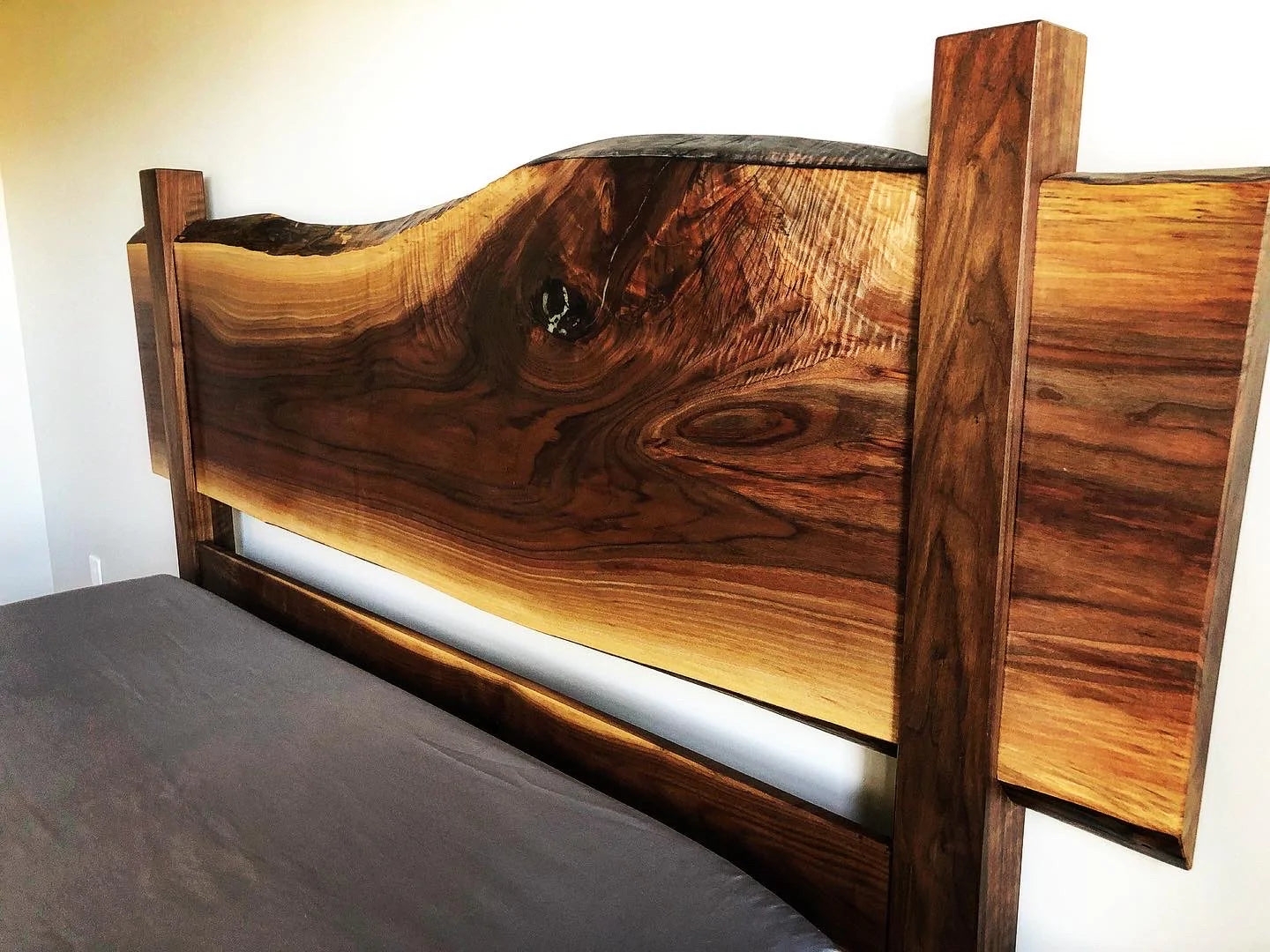 Bed Frame with Square Vertical Posts and Organic Wood Grain
