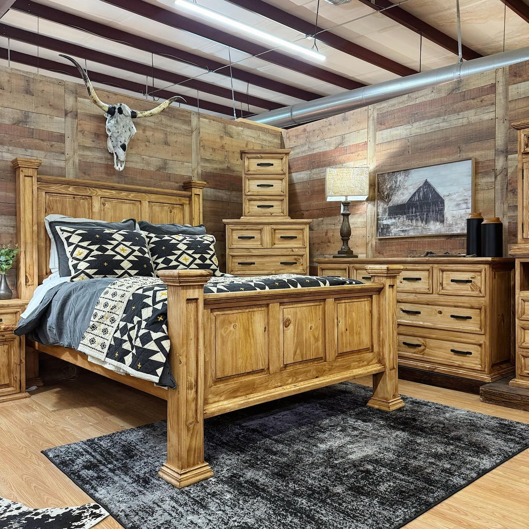 Bedroom Set Featuring Southwestern Pattern Bedding and Block Feet