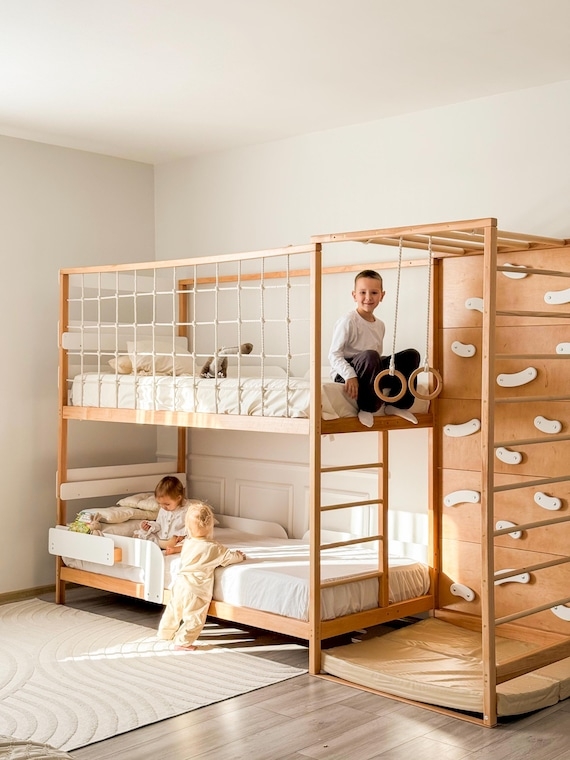 Bunk Bed Gym with Integrated Features and Climbing Wall