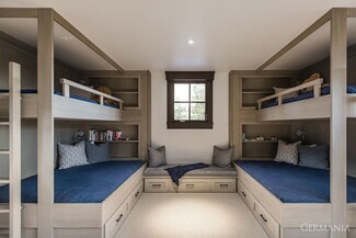 Bunk Beds: Integrated Shelving and Window Seat Luxury Bunk Room