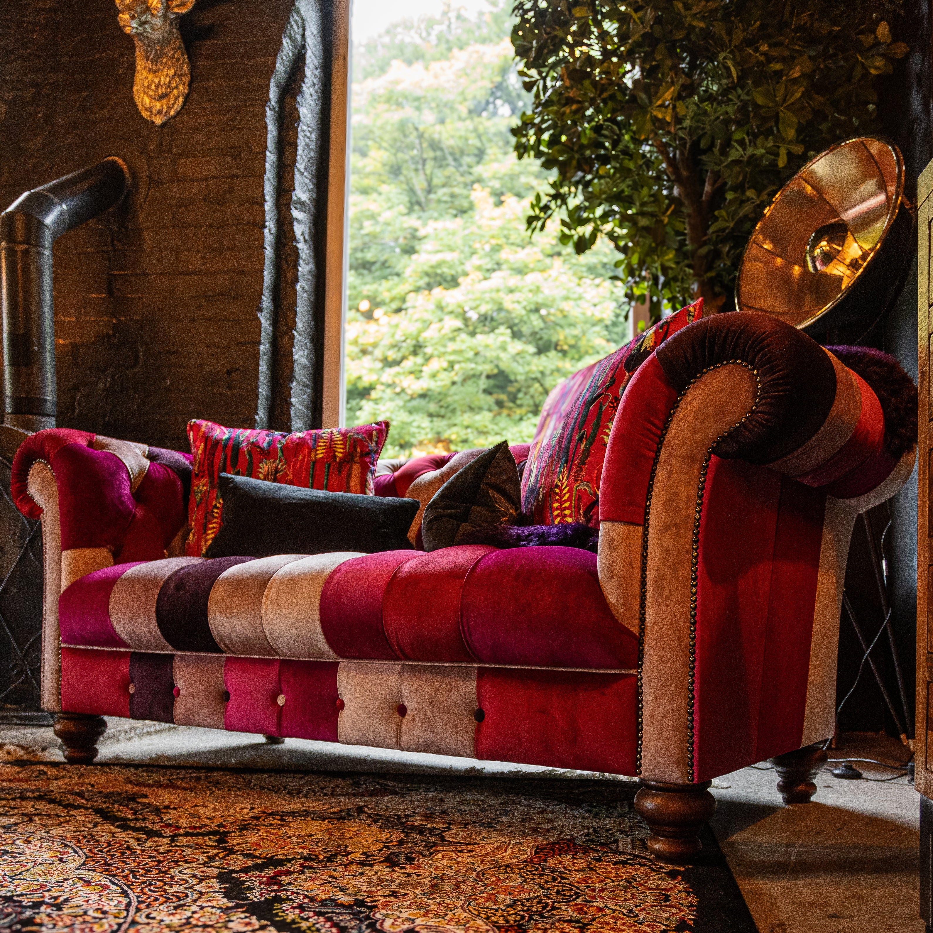 Chesterfield Sofa showcasing Magenta Tones and Harlequin
