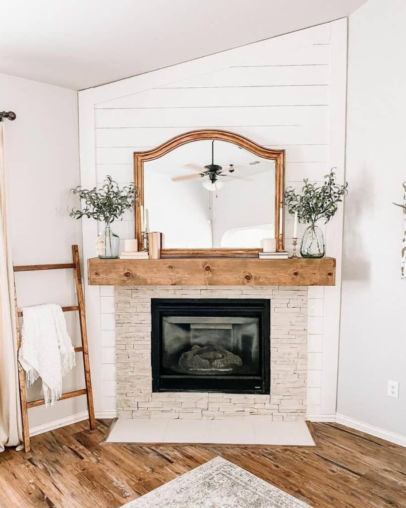 Corner Fireplace With Chunky Mantle And Shiplap Backdrop