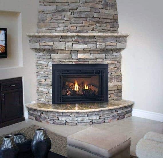 Corner Fireplace With Granite Hearth And Stacked Stone Facade