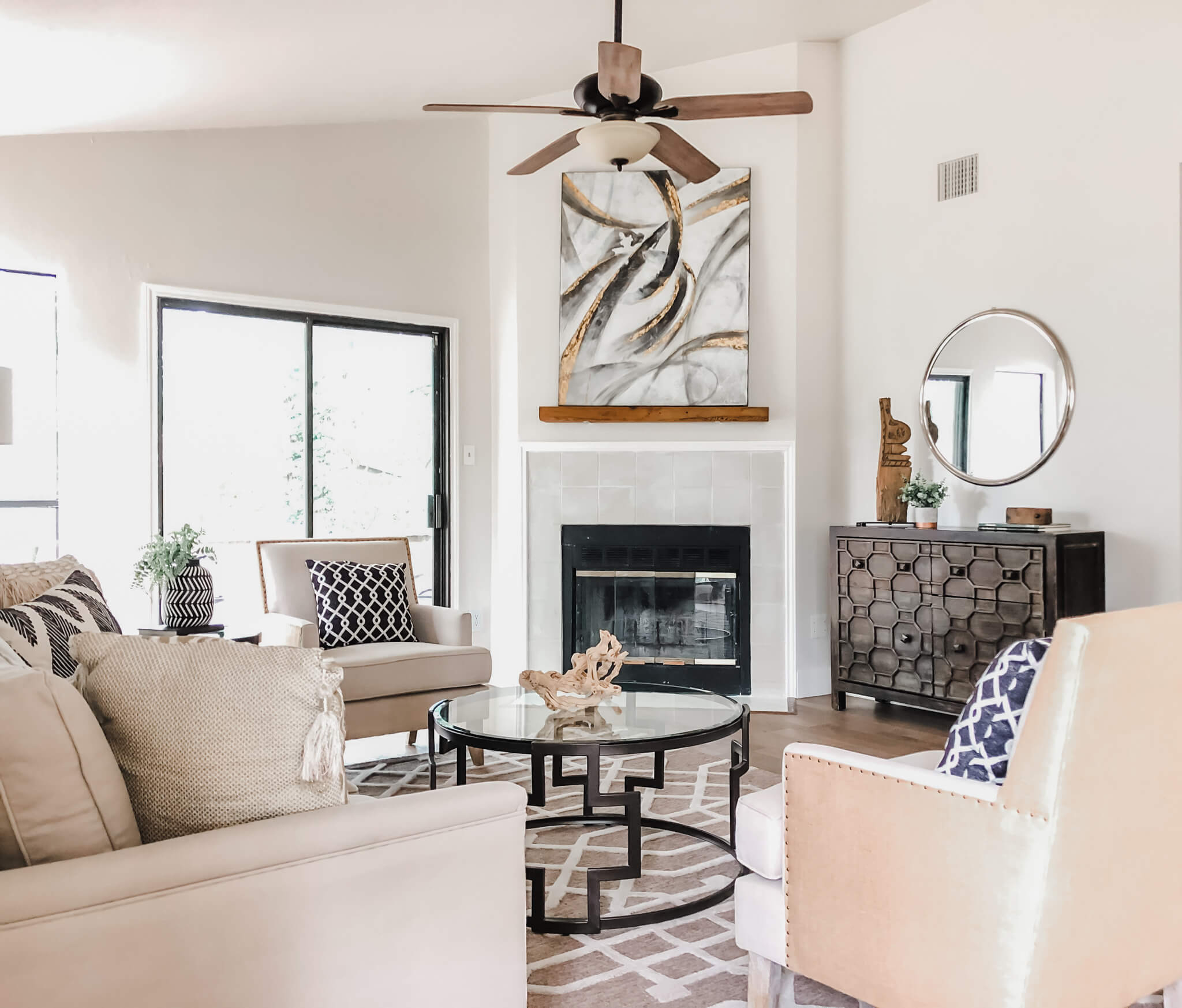 Corner Fireplace With Tile Surround And Abstract Focal Point