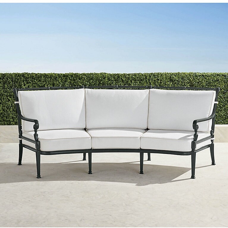 Curved Sofa featuring Onyx Frame and Traditional Bamboo Details