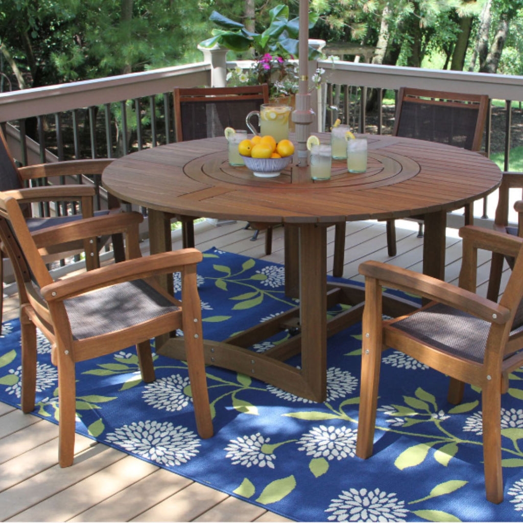Dining Set with Navy Floral Rug and Round Wood Patio Set