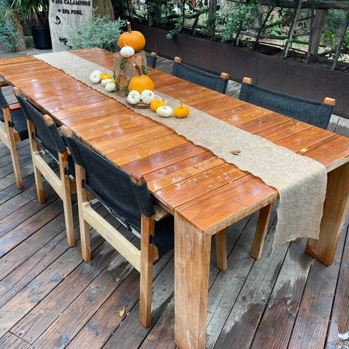 Dining Table: Slatted Wood Finish and Burlap Runner