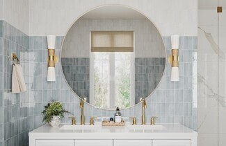 Double Vanity: Rope Wrapped Sconces and Round Metallic Mirror