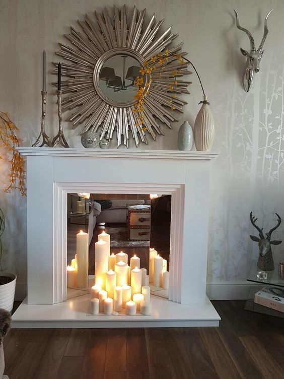 Faux Fireplace: Mirrored Firebox Tiered Neutral Pillar Candle Decor