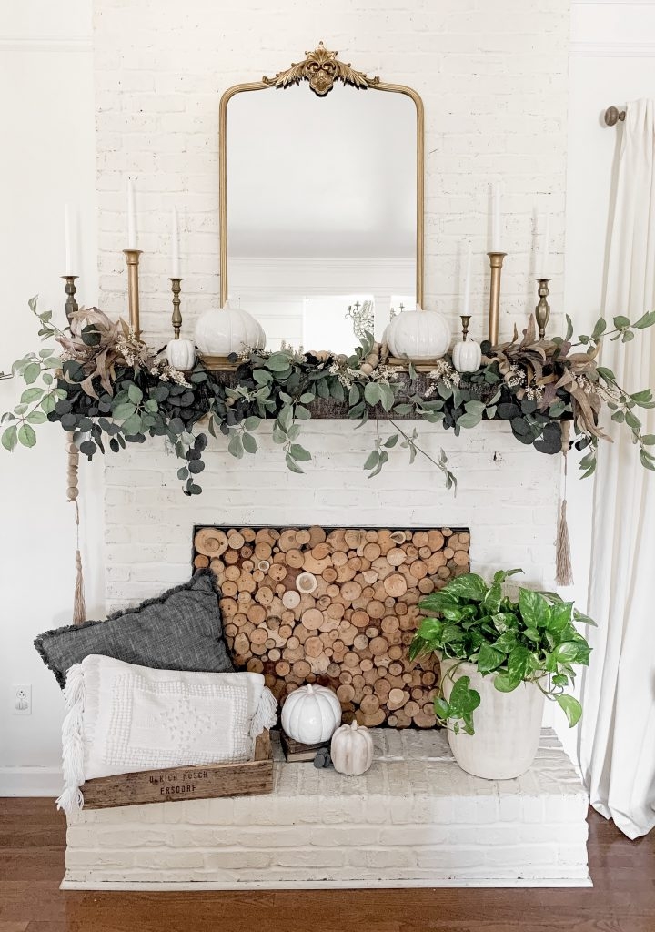 Fireplace Mantel: Ornate Arched Mirror Stacked Log Filler Decor Ideas