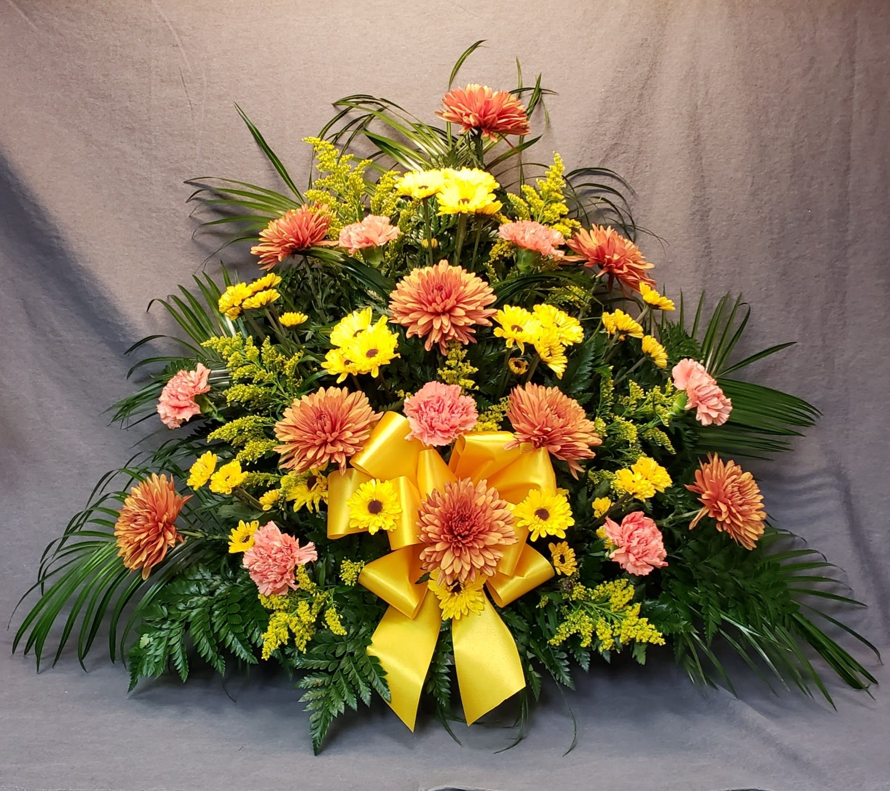 Floral Arrangement in Triangular Form with Large Satin Bow