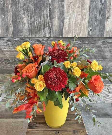 Floral Arrangement with Fall Leaf Accents and Yellow Vase