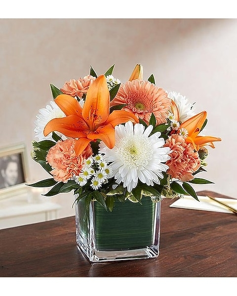 Flower Arrangement with Leaf Lined Vase and Square Vessel