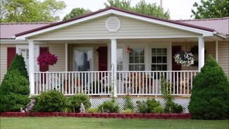 Front Porch Burgundy Accents and White Lattice Base